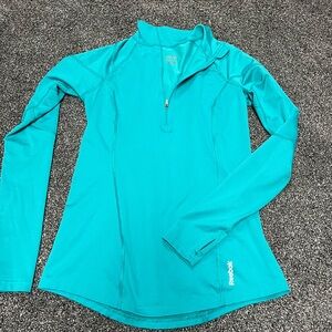 Reebok teal running top- with thumb holes size medium- great condition!